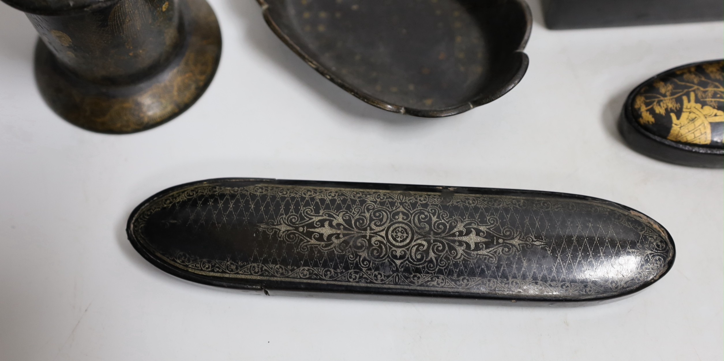 Six items of papier mache, two glasses cases, a cigar case, string box, pin tray and pencil box